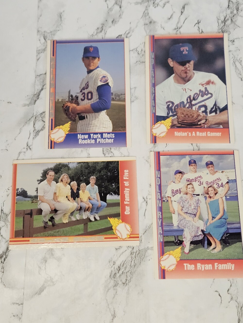 4 vintage Nolan Ryan baseball cards from the 1991 Pacific Texas Express series.